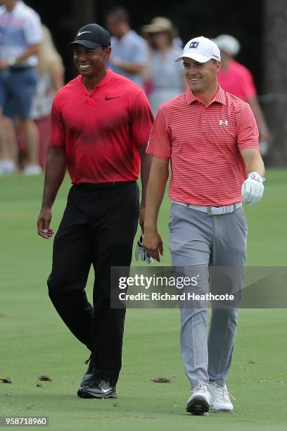 Tiger Woods and Jordan Spieth of the United States during the final round of THE PLAYERS Championship on the Stadium Course at TPC Sawgrass on May...