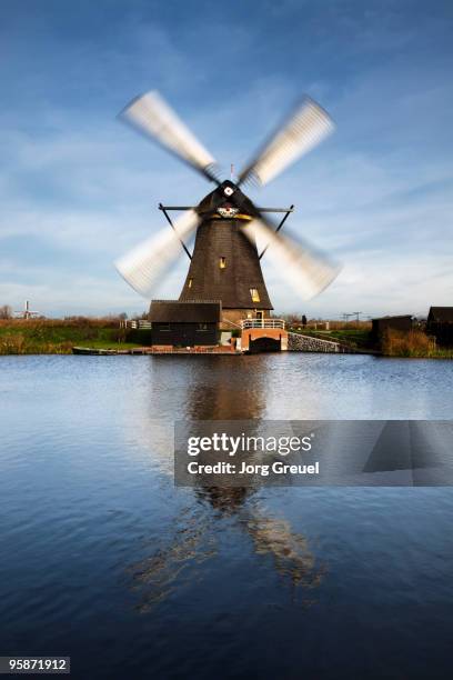 windmill by canal  - dutch windmill bildbanksfoton och bilder