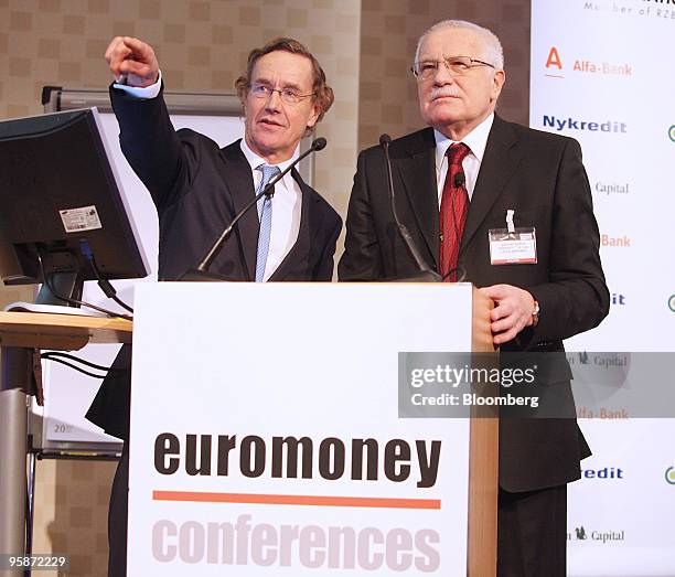 Richard Ensor, the managing director of Euromoney Institutional Invester PLC, left, speaks to Vaclav Klaus, the Czech Republic's president, at the...