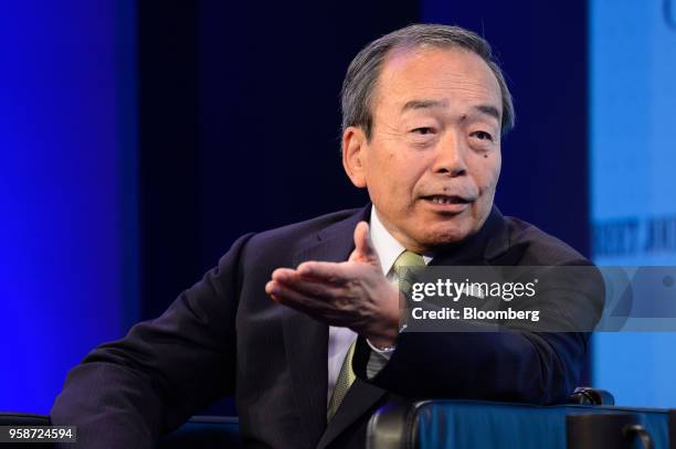 Takeshi Uchiyamada, chairman of Toyota Motor Corp., gestures while speaking during the Wall Street Journal CEO Council in Tokyo, Japan, on Tuesday,...