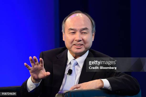 Masayoshi Son, chairman and chief executive officer of SoftBank Group Corp., gestures during the Wall Street Journal CEO Council in Tokyo, Japan, on...