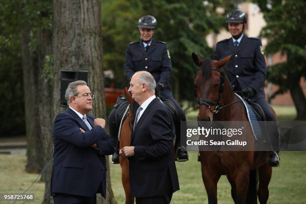 Dieter Romann , head of the German Federal Police and Brandenburg state Governor Dietmar Woidke chat prior to the arrival of German Interior Minister...