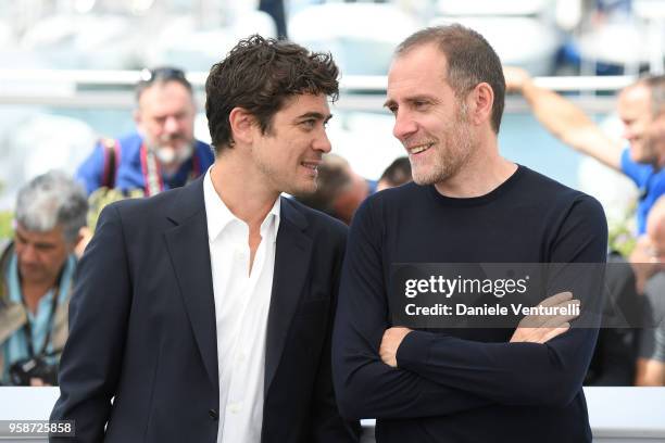 Actor Riccardo Scamarcio and Valerio Mastandrea attend the photocall for "Euforia" during the 71st annual Cannes Film Festival at Palais des...