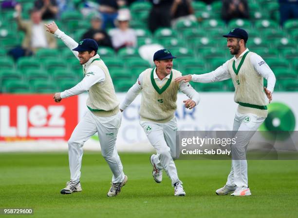 Dublin , Ireland - 15 May 2018; Ed Joyce of Ireland, left, celebrates with team-mates William Porterfield, centre, and Andrew Balbirnie, right, after...