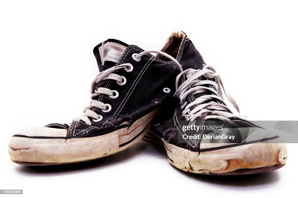 Ratty, old pair of black converse sneakers