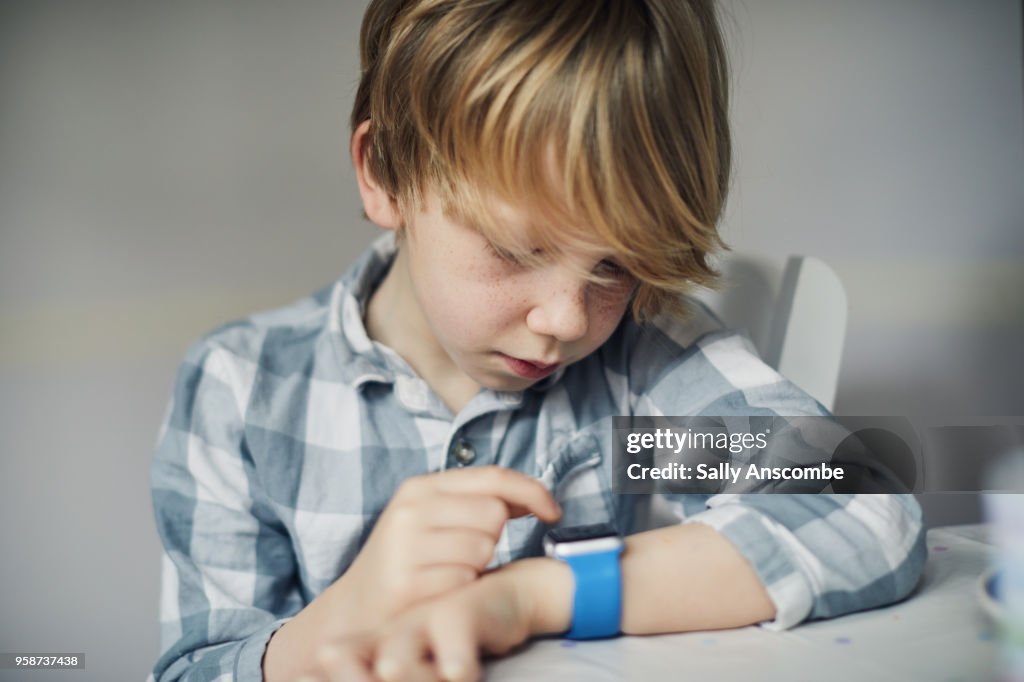 Child using a smart watch