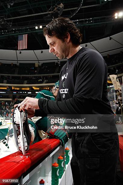 Tony DaCosta sharpens the skates of Andrew Brunette of the Minnesota Wild prior to the game against the Pittsburgh Penguins at the Xcel Energy Center...