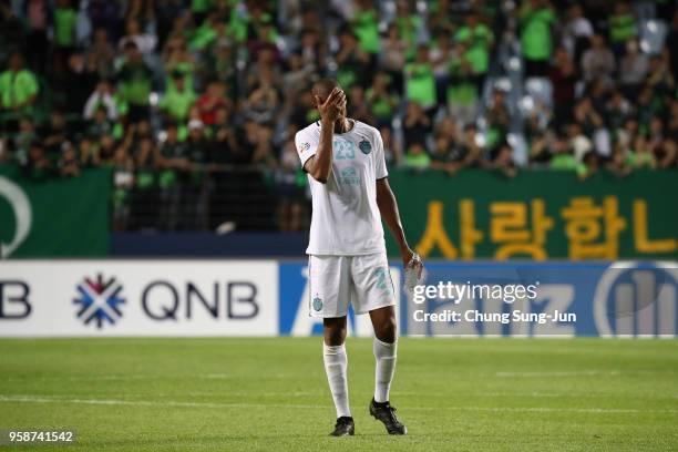 Edgar of Buriram United shows dejection after his side's 0-2 defeat in the AFC Champions League Round of 16 second leg match between Jeonbuk Hyundai...