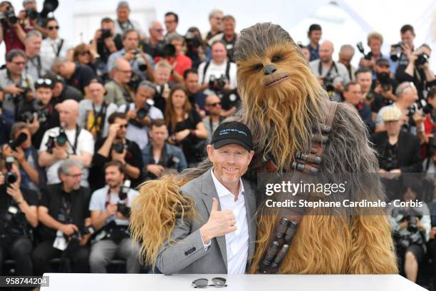 Director Ron Howard gives the thumbs up with Chewbacca at the photocall for "Solo: A Star Wars Story" during the 71st annual Cannes Film Festival at...