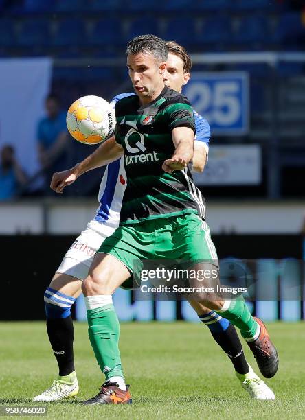 Daniel Hoegh of SC Heerenveen, Robin van Persie of Feyenoord during the Dutch Eredivisie match between SC Heerenveen v Feyenoord at the Abe Lenstra...