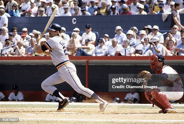 1980s: Outfielder Kirk Gibson of the Detroit Tigers hits a pitch during a Spring Training game against the Boston Red Sox in the 1980s in Winter...