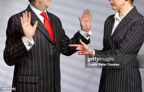 accused man holding up hands - caught cheating stockfoto's en -beelden