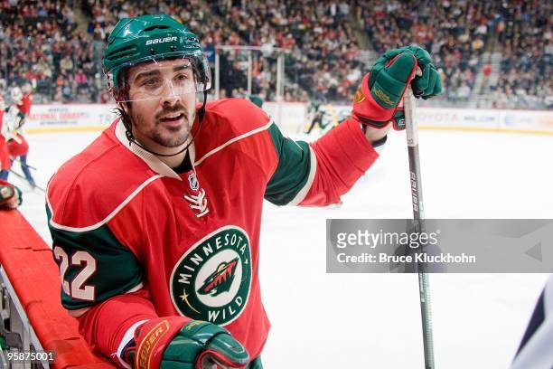 Cal Clutterbuck of the Minnesota Wild talks with an official during a timeout against the Vancouver Canucks during the game at the Xcel Energy Center...