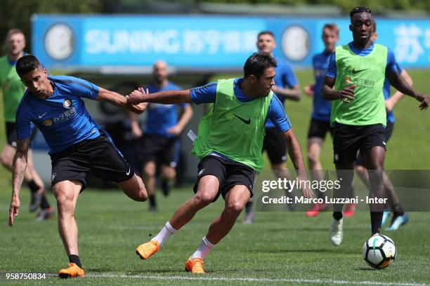 Eder Citadin Martins is challenged by Joao Cancelo during the FC Internazionale training session at the club's training ground Suning Training Center...