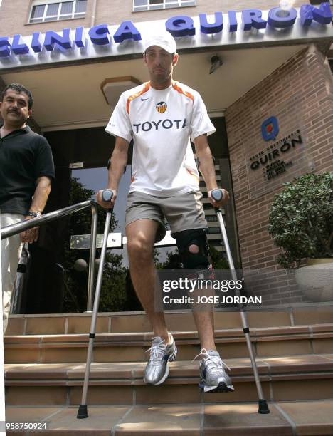 Valencia's football player Brazilian Eduardo Daud Gaspar "Edu" leaves a clinic after suffering a injury during a training session in Valencia, 20...