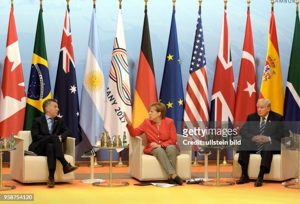 Summit in Hamburg : the meeting of the heads of state , Mauricio MACRI , President of Argentina , Angela MERKEL and Donald TRUMP , President of USA ,