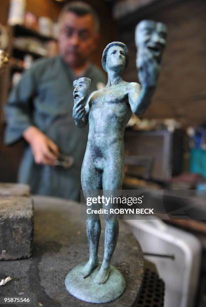 Artisan Joaquin Quintero works on an "Actor" statuette at the American Fine Arts Foundry in Burbank, California, January 19, 2010. The statuettes...