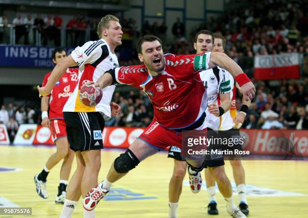 Bartosz Jurecki of Poland throws at goal during the Men's Handball European Championship Group C match between Germany and Poland at the Olympia Hall...