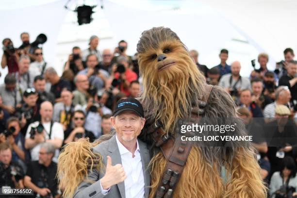 Director Ron Howard poses on May 15, 2018 with Chewbacca during a photocall for the film "Solo : A Star Wars Story" at the 71st edition of the Cannes...