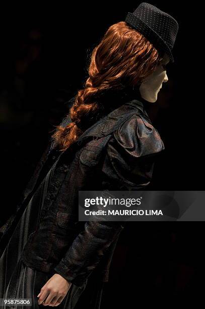 Model presents a creation by designer Ronaldo Fraga as part of the 2010-2011 Fall-Winter collections of the Sao Paulo Fashion Week, in Sao Paulo,...