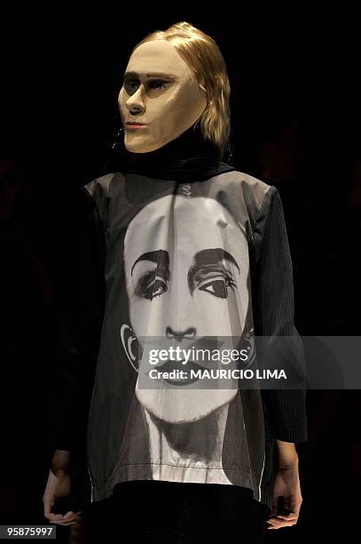 Model presents a creation by designer Ronaldo Fraga as part of the 2010-2011 Fall-Winter collections of the Sao Paulo Fashion Week, in Sao Paulo,...