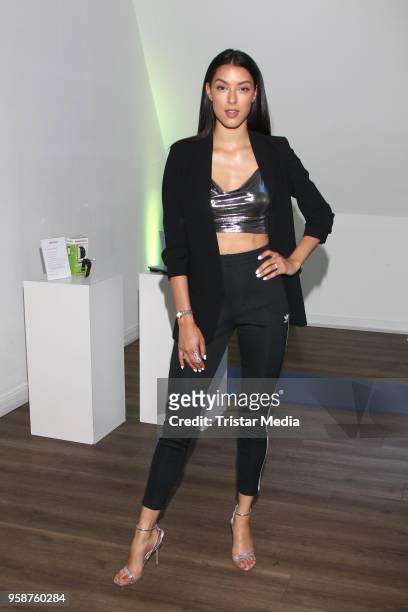 Model Rebecca Mir presents her new workout program at Fischereihaus on May 15, 2018 in Hamburg, Germany.