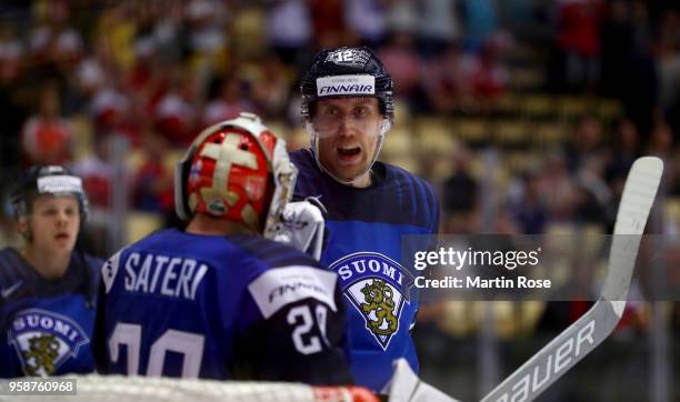 Marko Antilla of Finland celebrate with team mate Harri Sateri after the 2018 IIHF Ice Hockey World Championship Group B game between Finland and...