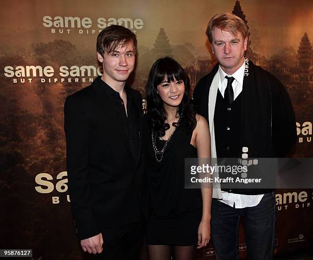 Actor David Kross, actress Apinya Sakuljaroensuk and director Detlev Buck attend the 'Same Same But Different' premiere at the Cinemaxx on January...