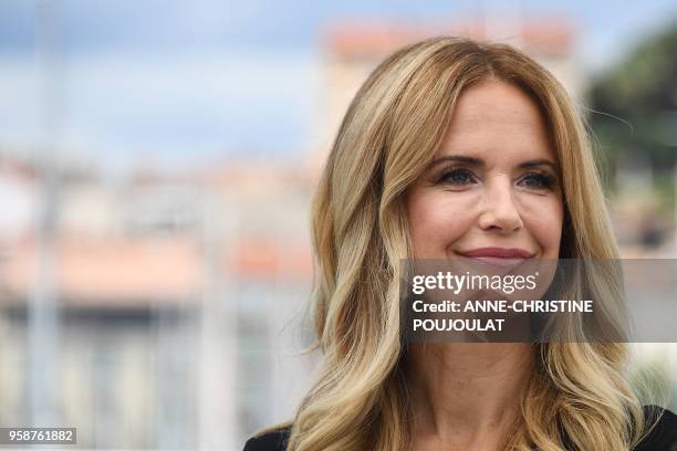 Actress Kelly Preston poses on May 15, 2018 during a photocall for the film "Gotti" at the 71st edition of the Cannes Film Festival in Cannes,...