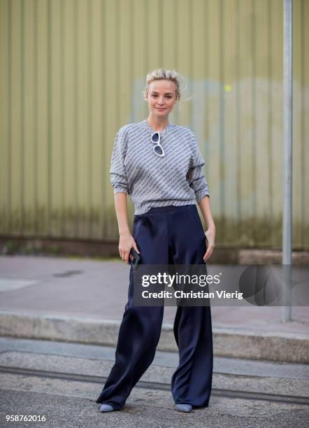 Nadia Fairfax wearing grey Balenciaga sweater, blue flared pants during Mercedes-Benz Fashion Week Resort 19 Collections at Carriageworks on May 15,...