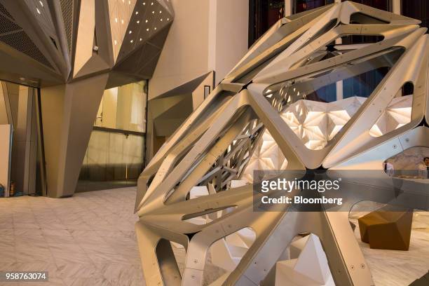 Structures stand in the porte cochere at the Morpheus hotel, developed by Melco Resorts & Entertainment Ltd., during a media tour in Macau, China, on...