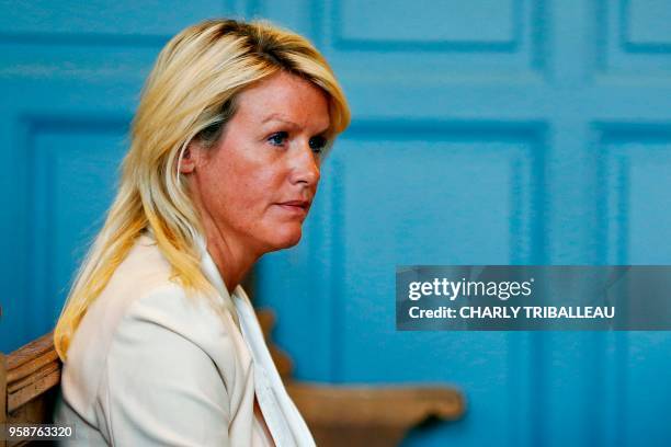 Alice Bertheaume, partner of late French writer Gonzague Saint Bris, looks on at the courthouse in Lisieux, northwestern France, on May 15, 2018 to...