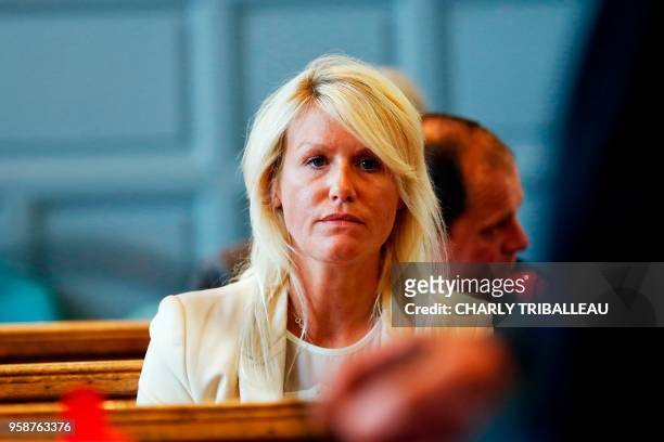 Alice Bertheaume, partner of late French writer Gonzague Saint Bris, looks on at the courthouse in Lisieux, northwestern France, on May 15, 2018 to...
