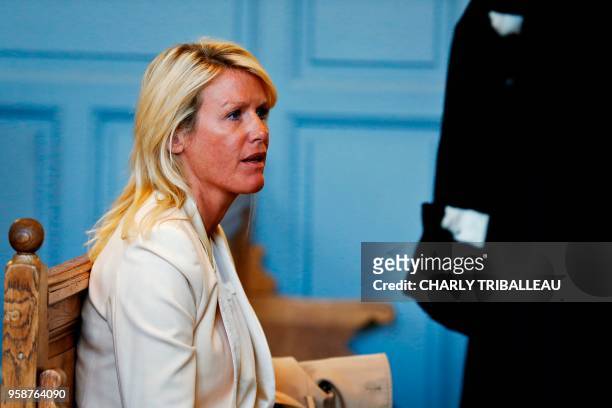 Alice Bertheaume, partner of late French writer Gonzague Saint Bris, looks on at the courthouse in Lisieux, northwestern France, on May 15, 2018 to...
