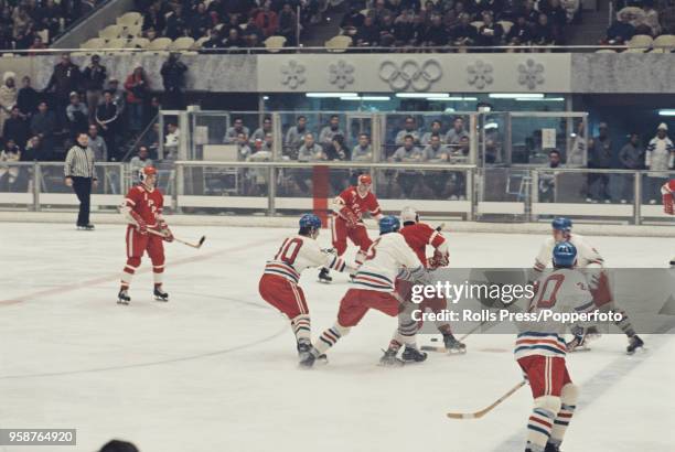 View of action between Czechoslovakia and Japan in the Men's ice hockey tournament at the 1972 Winter Olympics at the Makomanai Ice Arena in Sapporo,...