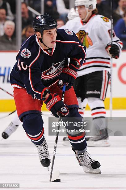 Forward Jared Boll of the Columbus Blue Jackets skates with the puck against the Chicago Blackhawks on January 16, 2010 at Nationwide Arena in...