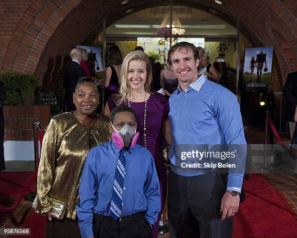 Valetta Roshell and Micah Roshell arrive with New Orleans Saints NFL Quarterback Drew Brees and his wife Brittany Brees attend "The Blind Side"...