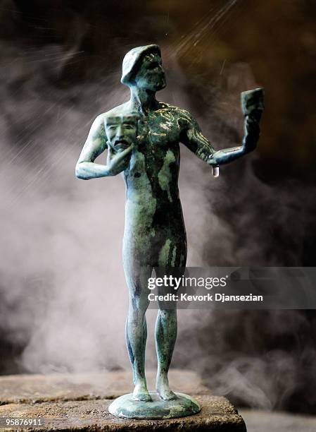 Worker applies the green-black patina to an "The Actor" statuette at the American Fine Arts Foundry on January 19, 2010 in Burbank, California. The...