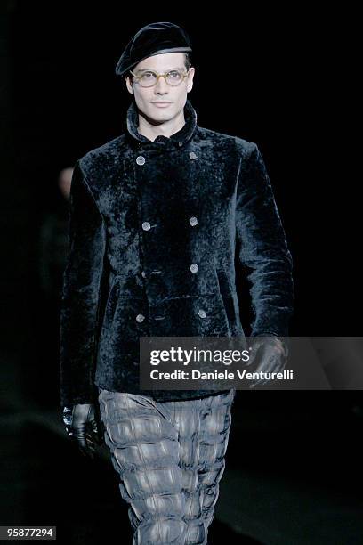 Model walks the runway during the Giorgio Armani Milan Menswear Autumn/Winter 2010 show on January 19, 2010 in Milan, Italy.