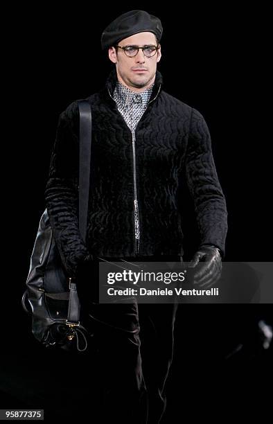 Model walks the runway during the Giorgio Armani Milan Menswear Autumn/Winter 2010 show on January 19, 2010 in Milan, Italy.