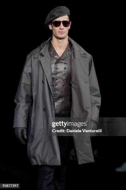 Model walks the runway during the Giorgio Armani Milan Menswear Autumn/Winter 2010 show on January 19, 2010 in Milan, Italy.