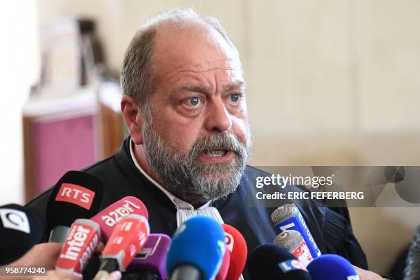 Eric Dupond-Moretti, one of the lawyers of former French budget minister Jerome Cahuzac, speaks to journalists after the hearing of Cahuzac's appeal...