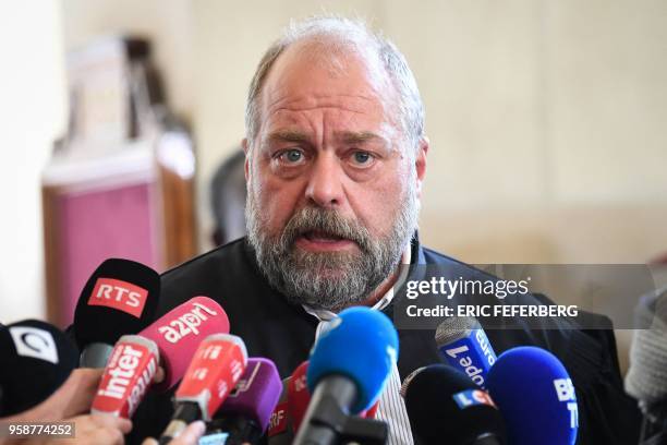 Eric Dupond-Moretti, one of the lawyers of former French budget minister Jerome Cahuzac, speaks to journalists after the hearing of Cahuzac's appeal...