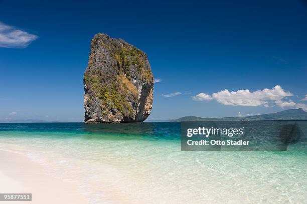 sandy beach, limestone stack in sea, ko poda - koh poda stock pictures, royalty-free photos & images