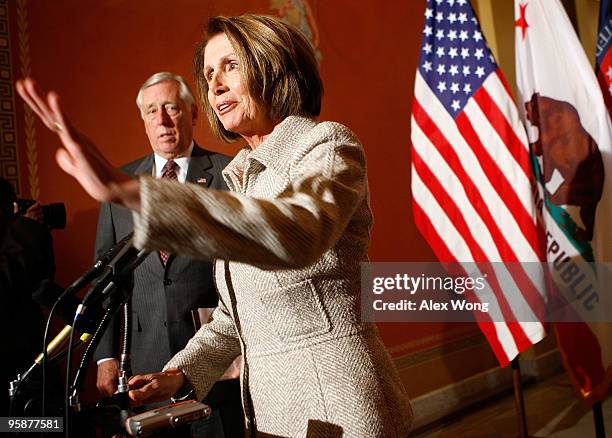 Speaker of the House Rep. Nancy Pelosi speaks to the media as House Majority Leader Rep. Steny Hoyer listens during a press availability January 19,...