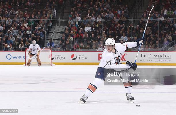 Denis Grebeshkov of the Edmonton Oilers shoots against the Colorado Avalanche at the Pepsi Center on January 18, 2010 in Denver, Colorado. Colorado...