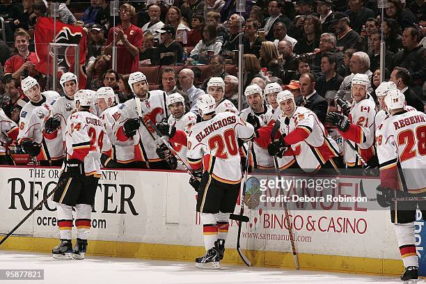 Curtis Glencross of the Calgary Flames celebrates with his teammates an unassisted goal in the second period against the Anaheim Ducks during the...