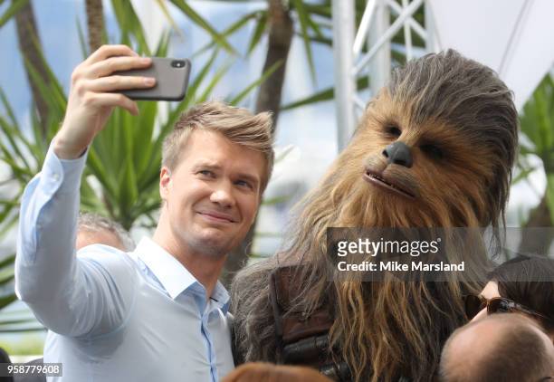 Joonas Suotamo and Chewbacca attend the photocall for "Solo: A Star Wars Story" during the 71st annual Cannes Film Festival at Palais des Festivals...