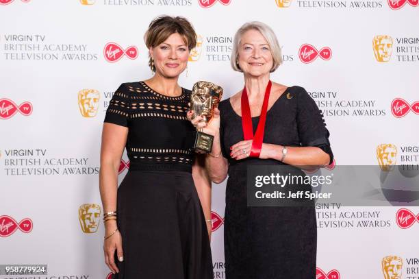 Presenter Kate Silverton and winner of the Fellowship award, Kate Adie pose in the press room at the Virgin TV British Academy Television Awards at...