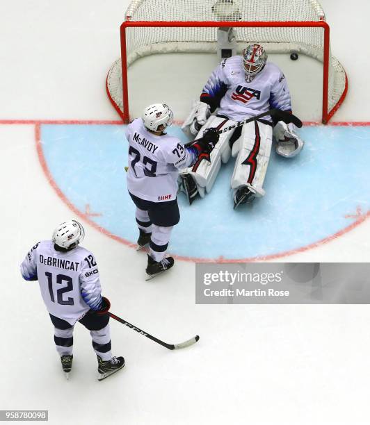 Keith Kinkaid, goaltender of the United States, Alec Martinez and Alex Debrincat react during the 2018 IIHF Ice Hockey World Championship Group B...